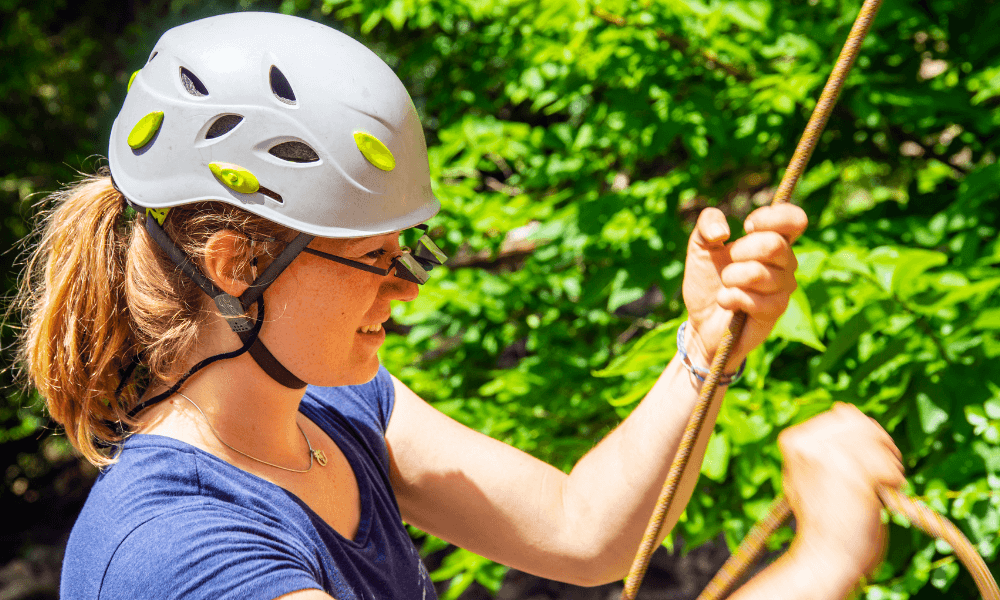 Belayer with belay glasses